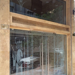 شیشه سورن - سند بلاست درب ورودی فروشگاه